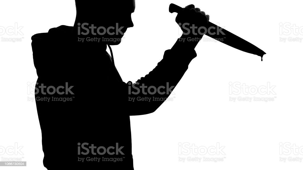 Foto de Louco Assassino Segurando Afiada Faca Ensanguentada Arma Do Crime  Perigo E Terror e mais fotos de stock de Adulto - iStock