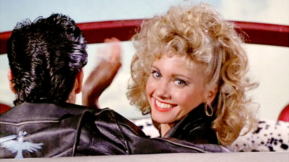 Olivia Newton-John em cena de Grease: Nos tempos da brilhantina - Foto: Reprodução